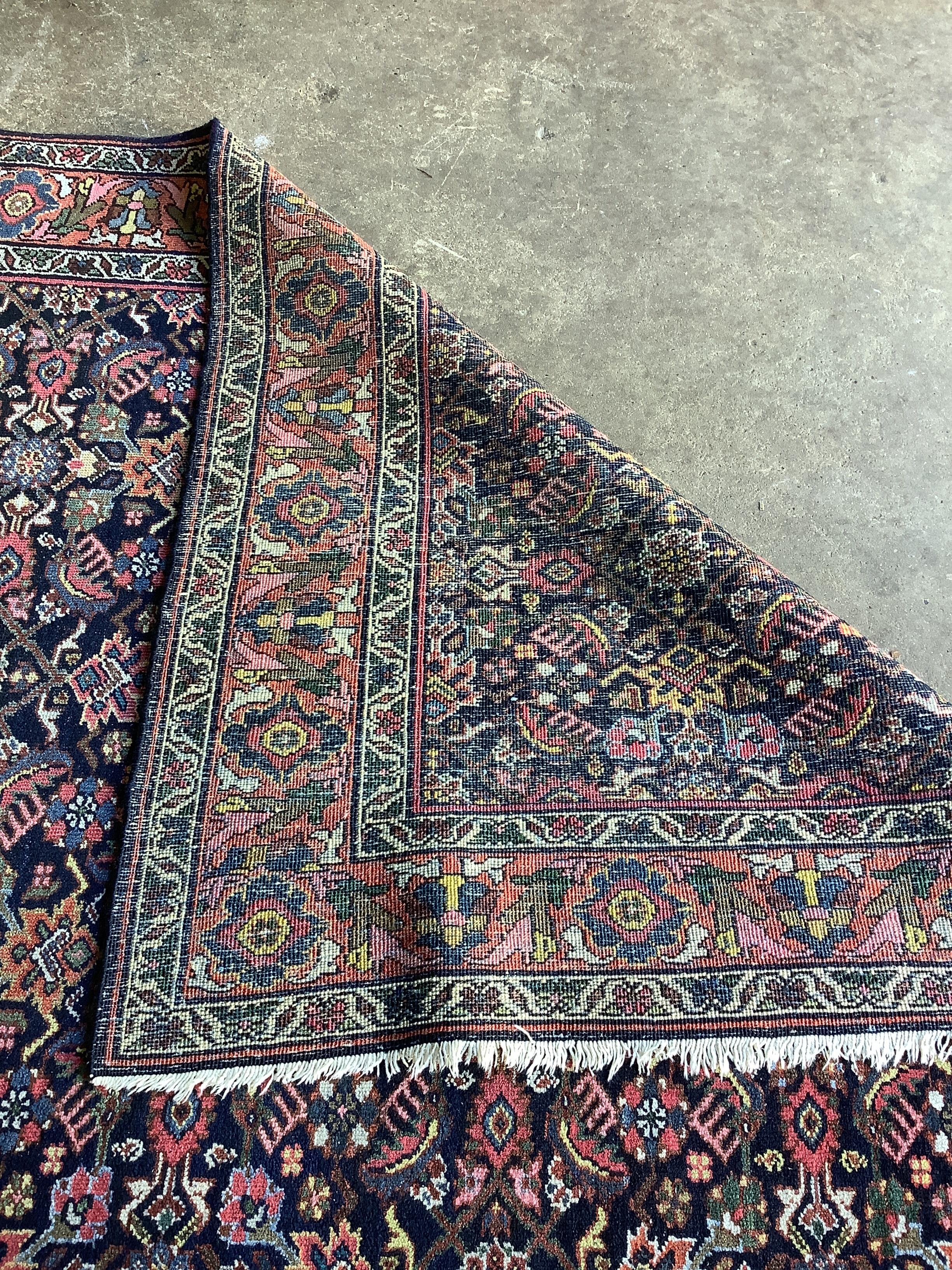 A North West Persian Mahal blue ground corridor carpet, last quarter of the 19th century, 315 x 158cm